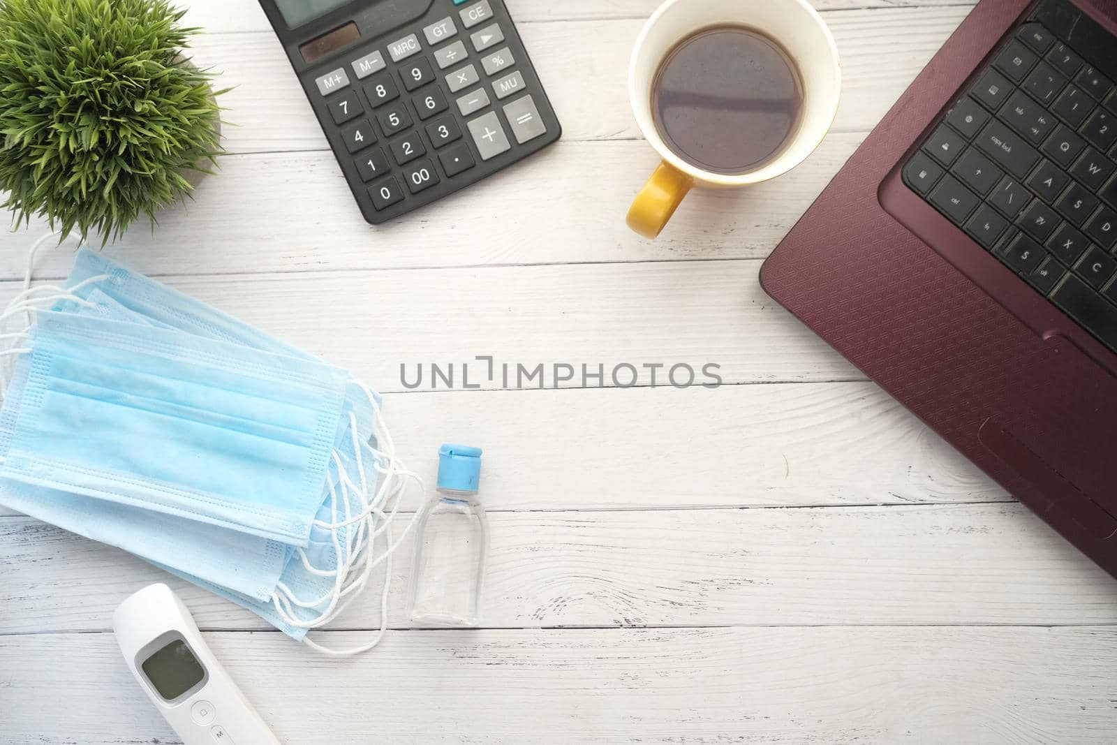 Close up of blue surgical masks on table.