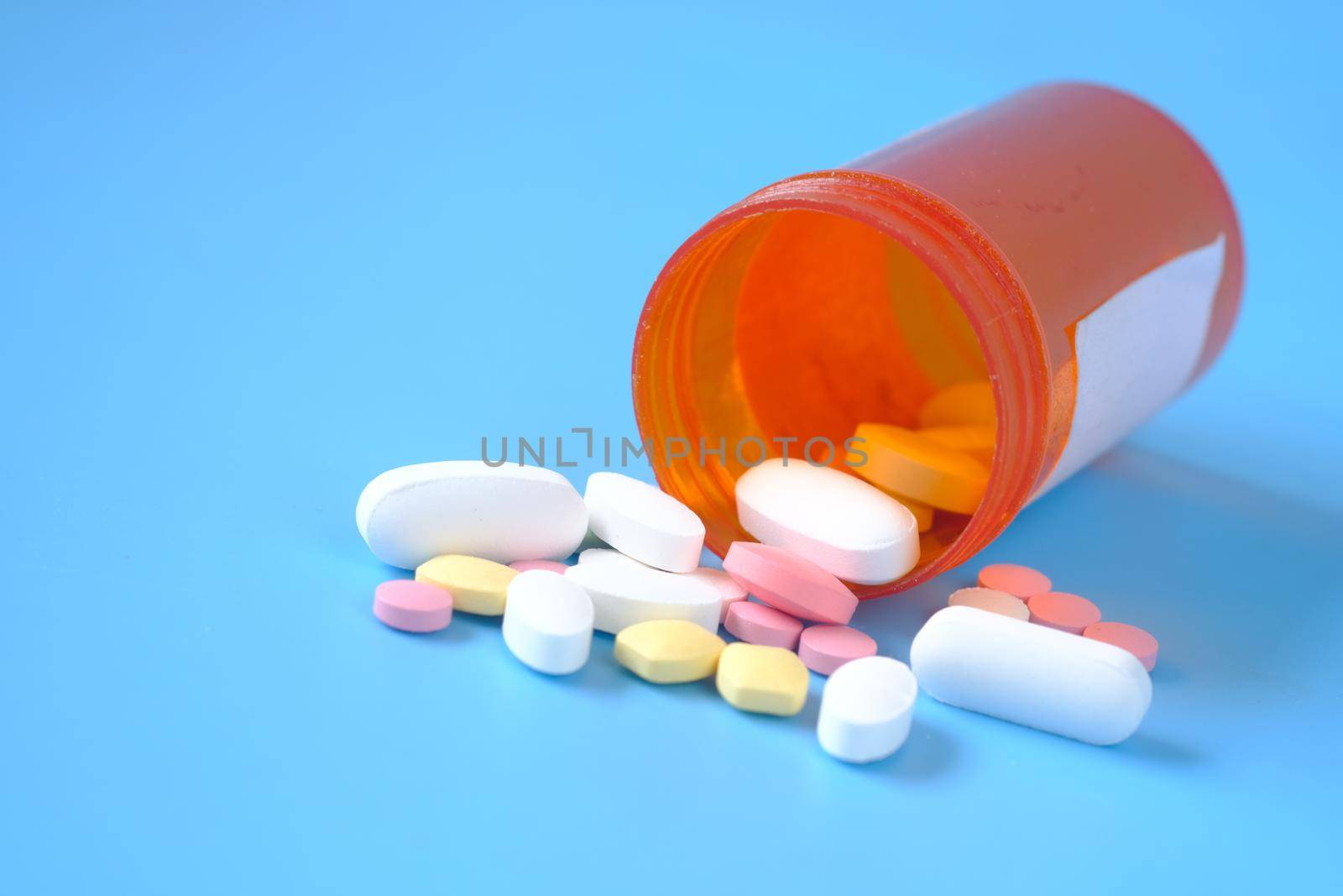selective focus. Close up of many colorful pills and capsules .