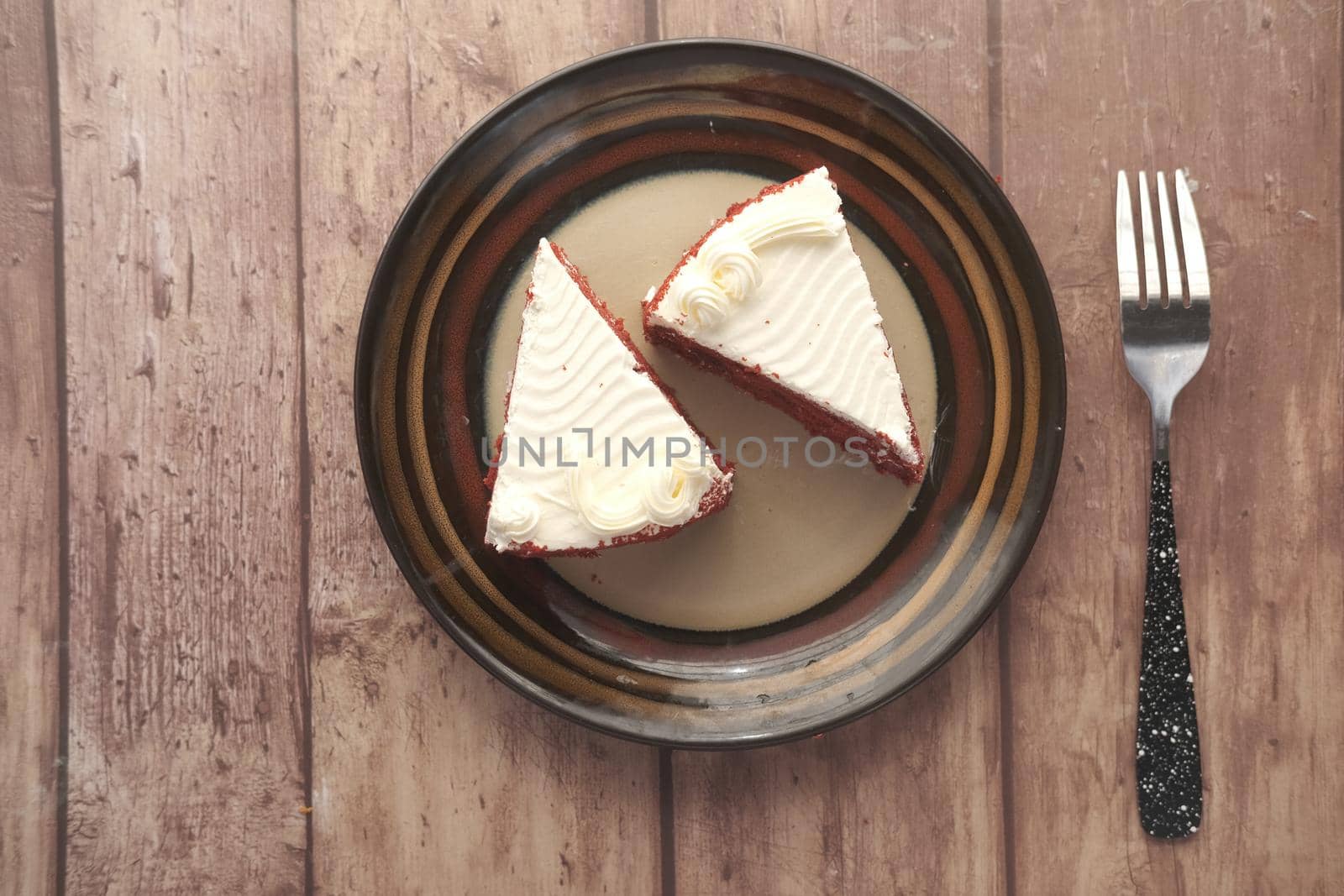 red velvet cake on plate .