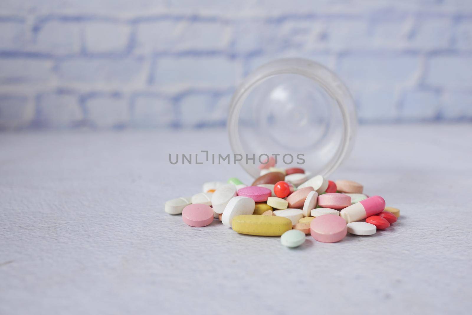 selective focus. Close up of many colorful pills and capsules .