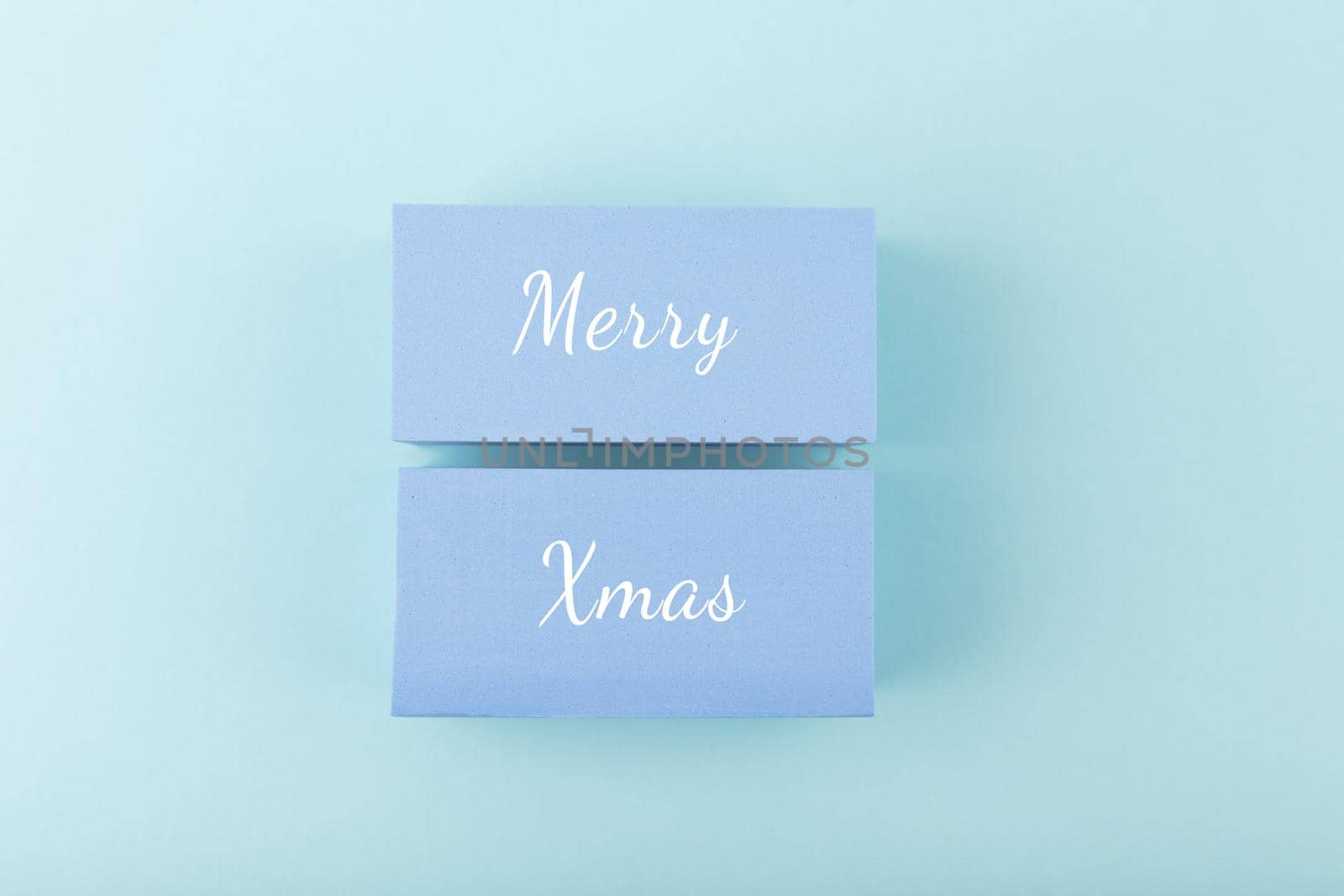 Merry Christmas minimal concept in light pastel blue colors by Senorina_Irina