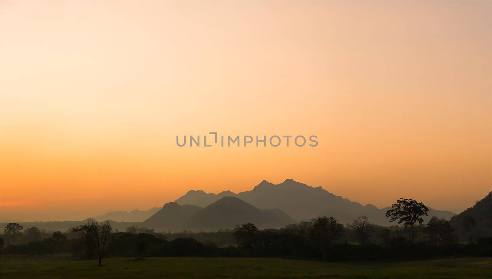 landscape mountain with golden sky hours in the morning sunrise in twilight time