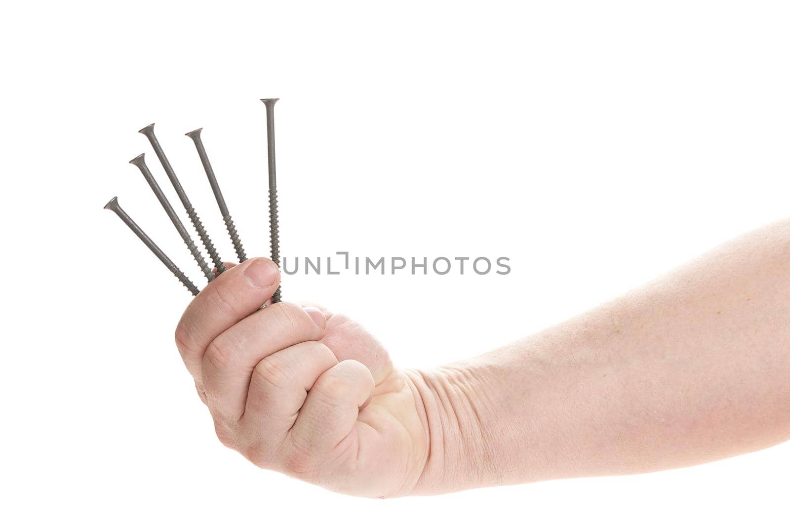 Hand holds metal screws on a white background, a template for designers. Close up