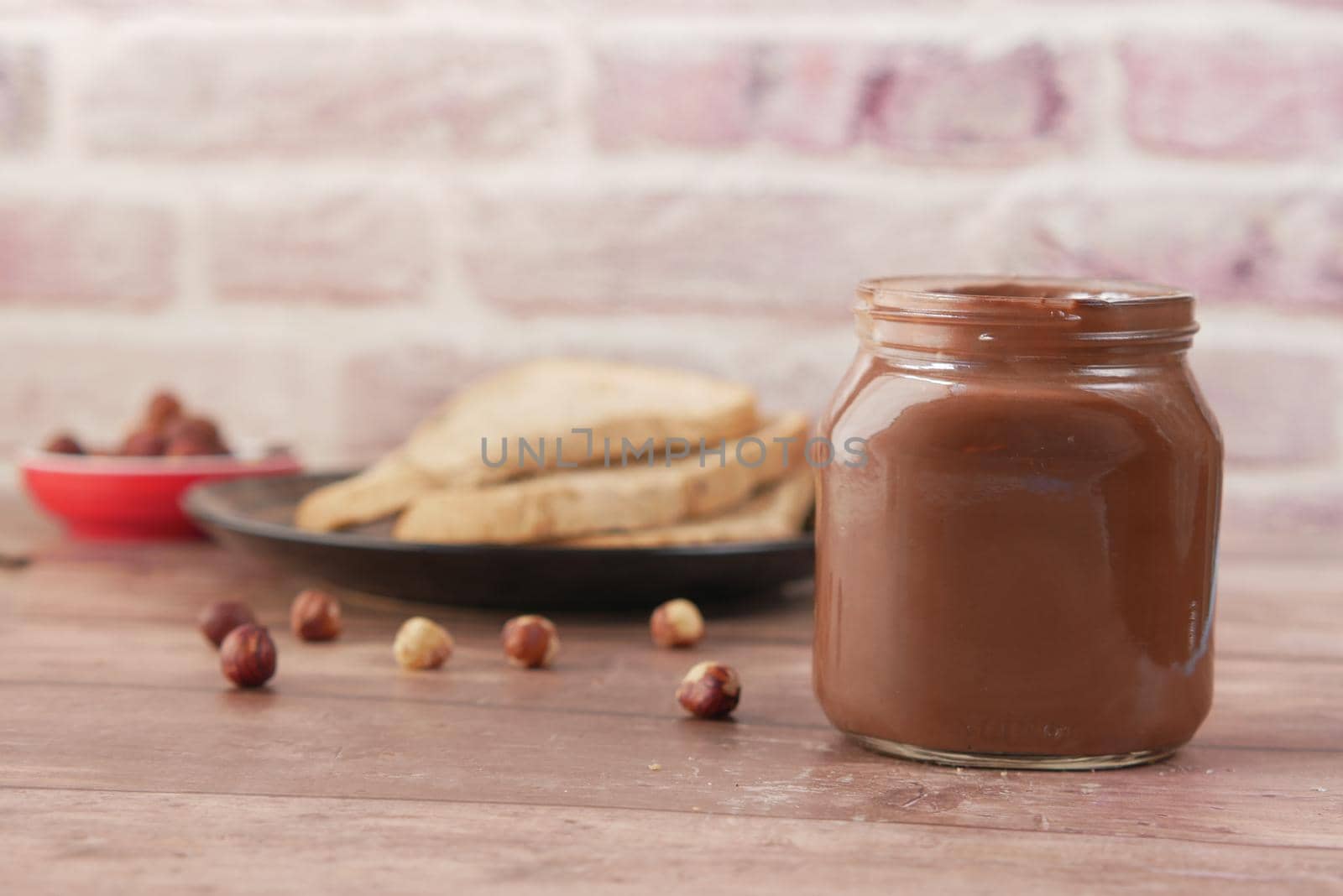 Chocolate Hazelnut Spread on a Bread on Table
