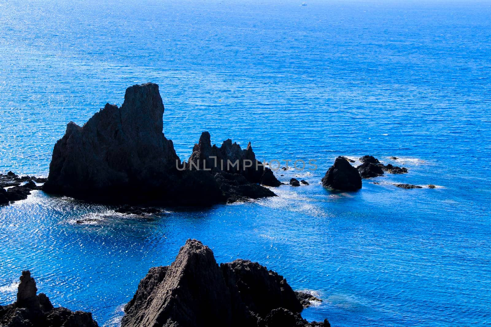 Reef of the Sirens in Cabo de Gata-Nijar natural park, Almeria, Spain on a sunny day of summer.