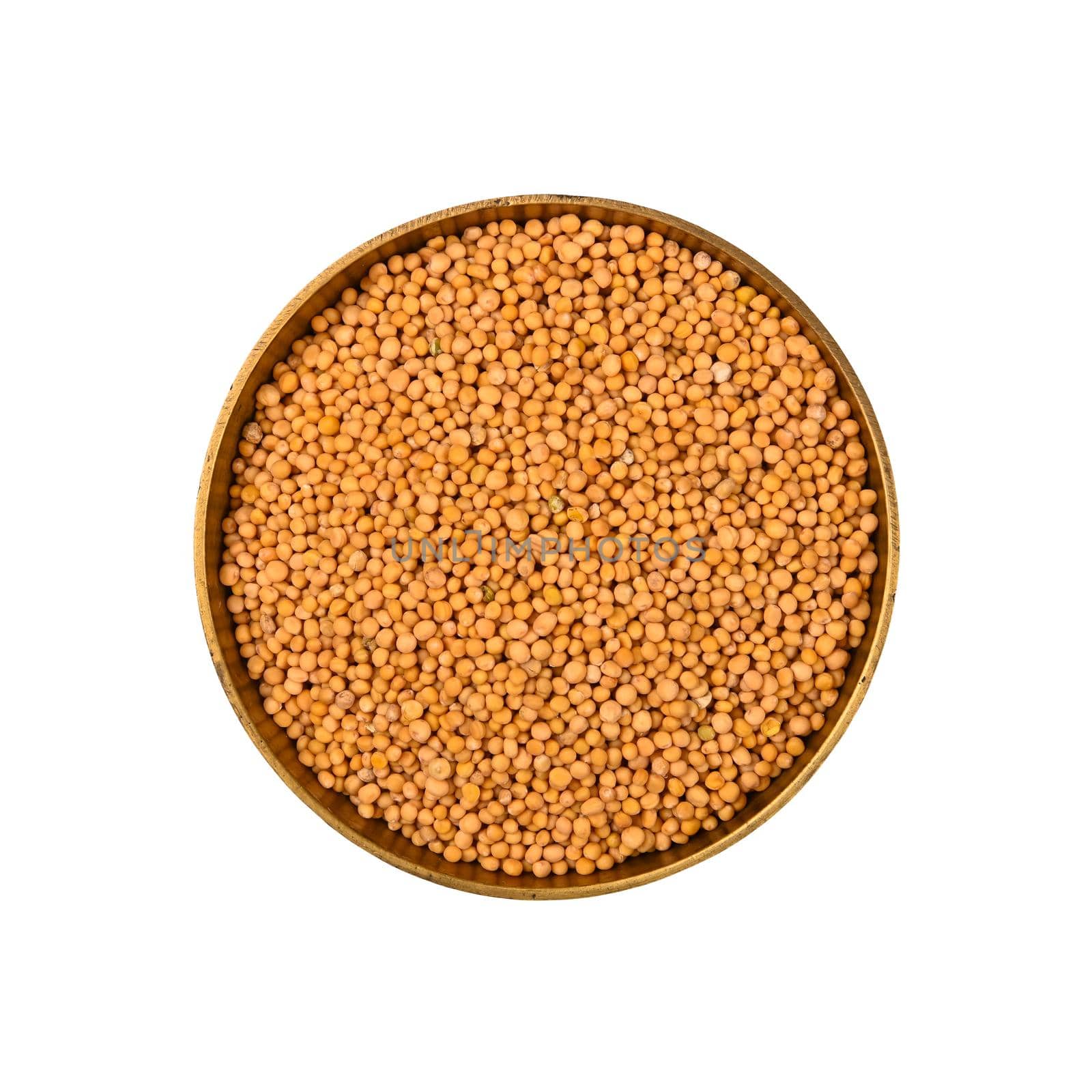 Bowl of yellow mustard seeds isolated by BreakingTheWalls