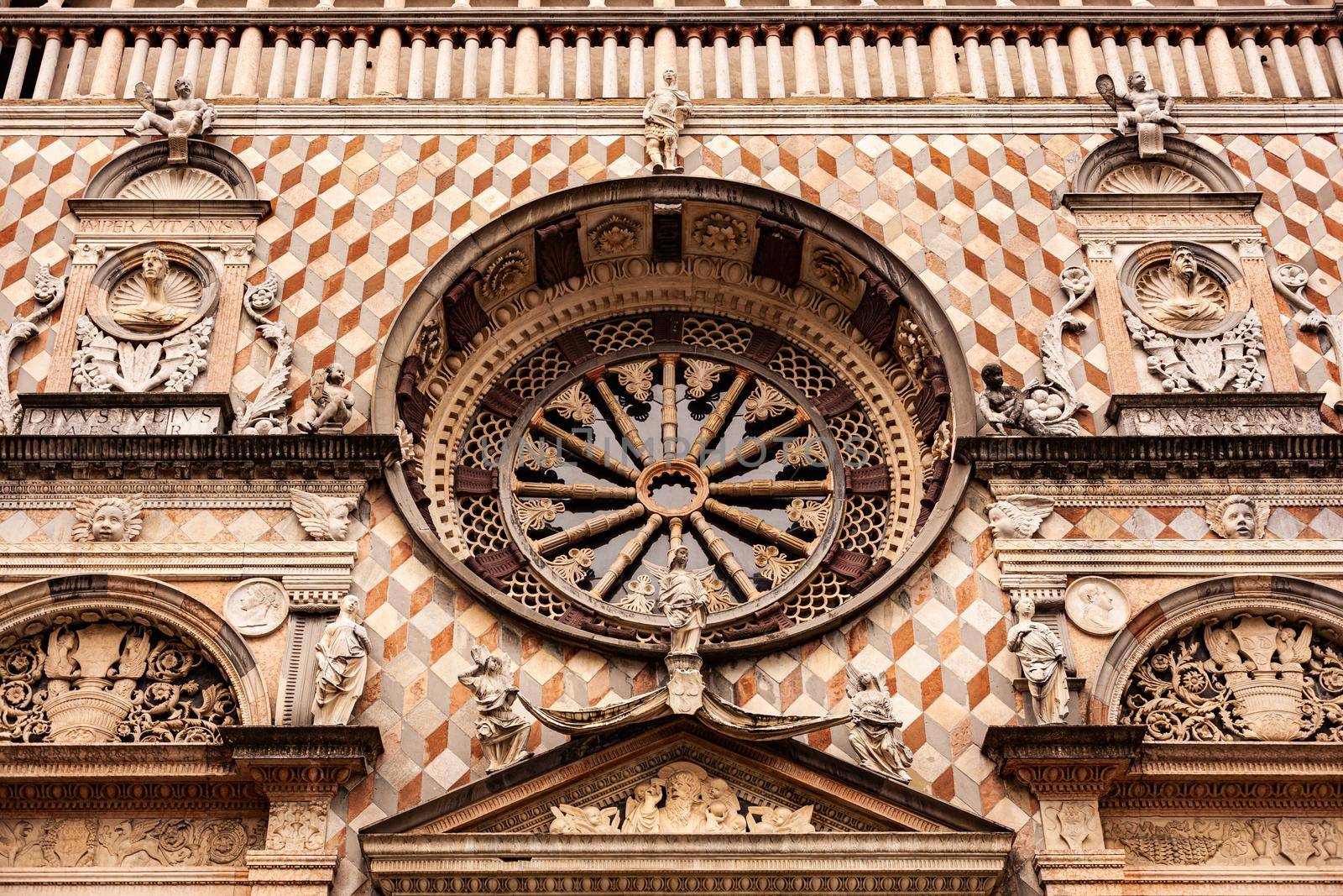 The rose window of the Cappella Colleoni (was built with marble elements between 1472 and 1476) of the Basilica di Santa Maria Maggiore. It major town church and was founded in 1137. Bergamo, Italy