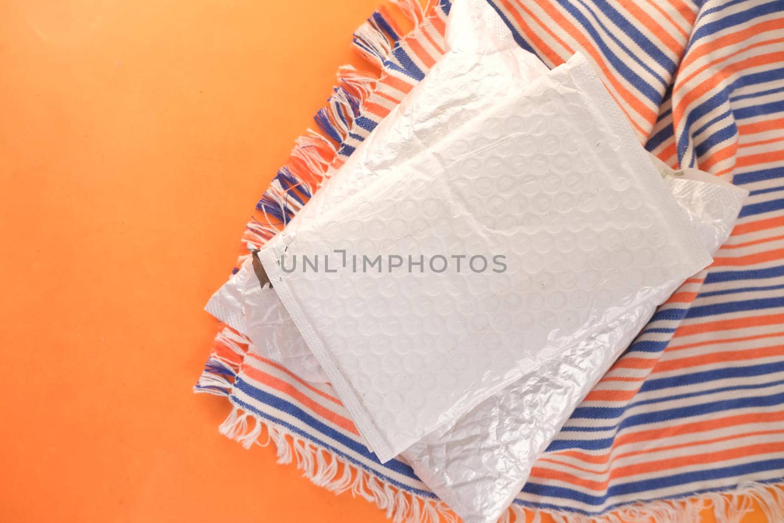 white paper bubble envelope for postal ship.,