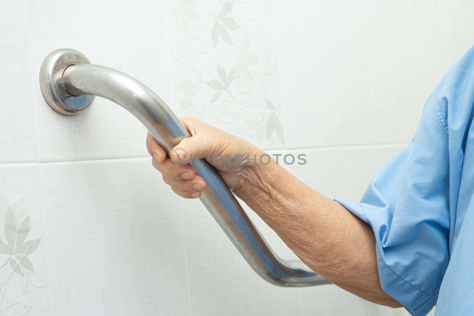 Asian senior or elderly old lady woman patient use toilet bathroom handle security in nursing hospital ward, healthy strong medical concept.