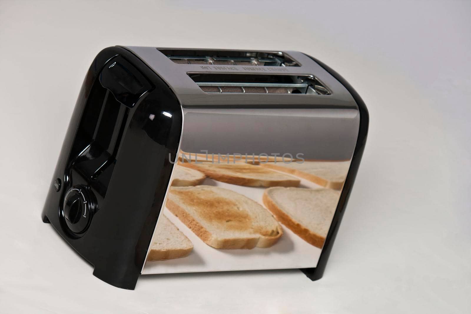Conceptual image of toaster with bread by jyurinko