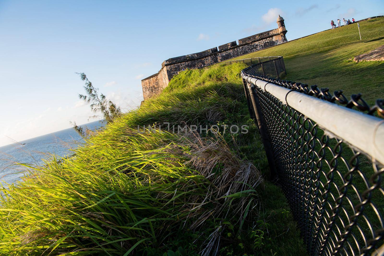 Abstract view of the castle in San Juan, Puerto Rico at sunset. Generations of soldiers lived at the fort and visitors today are inspired by the stories and architecture.