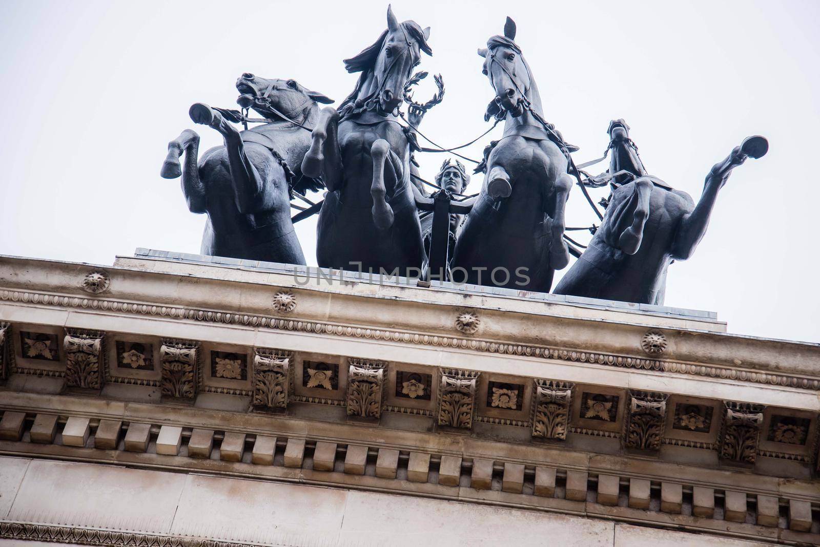 Horses of Helios Statue abstract view from below horses in Piccadilly London on January 27, 2017. by jyurinko