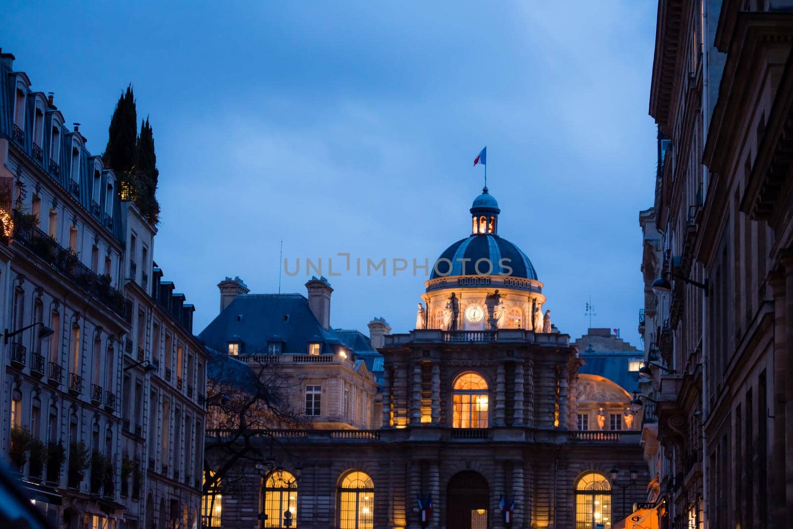 Paris, France - February 3, 2017: Evening view of dome with golden glow in Paris, France.