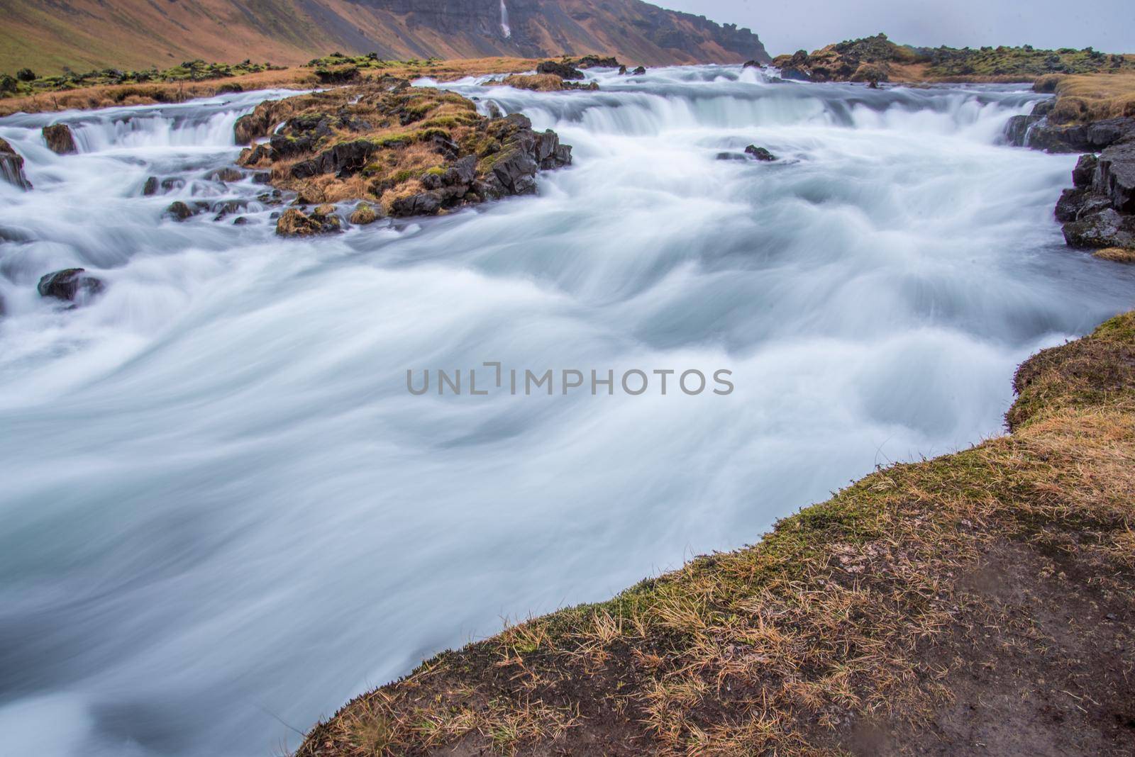 Mini waterfalls in landscape long exposure in Iceland by jyurinko