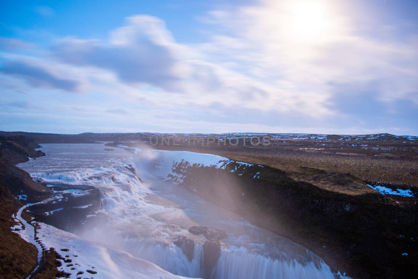 Godafoss waterfall in Iceland at sunset by jyurinko