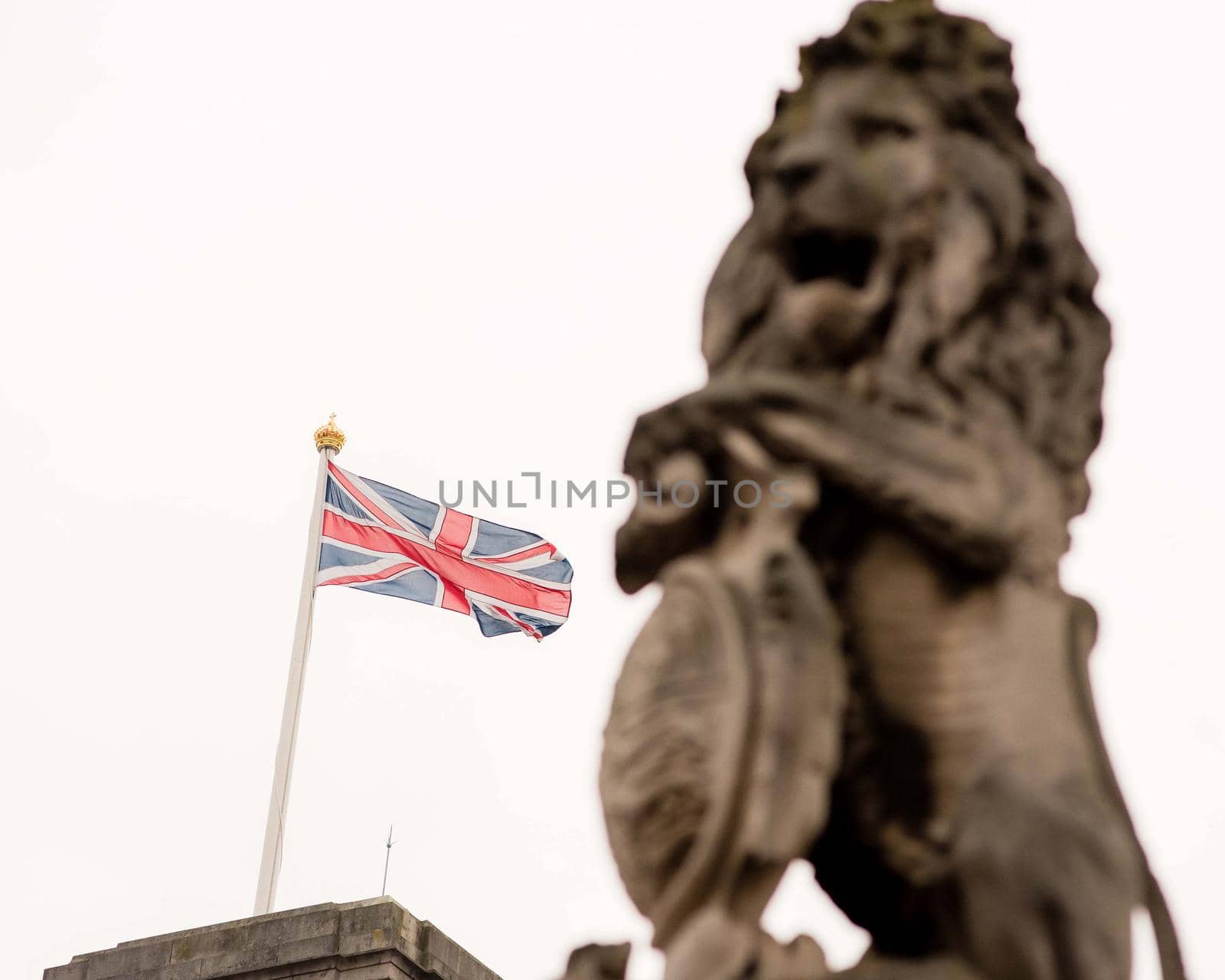 London, UK - January 29, 2017: A detail photo of the Victoria Memorial including a unicorn and lion statue outside of Buckingham Palace in London.