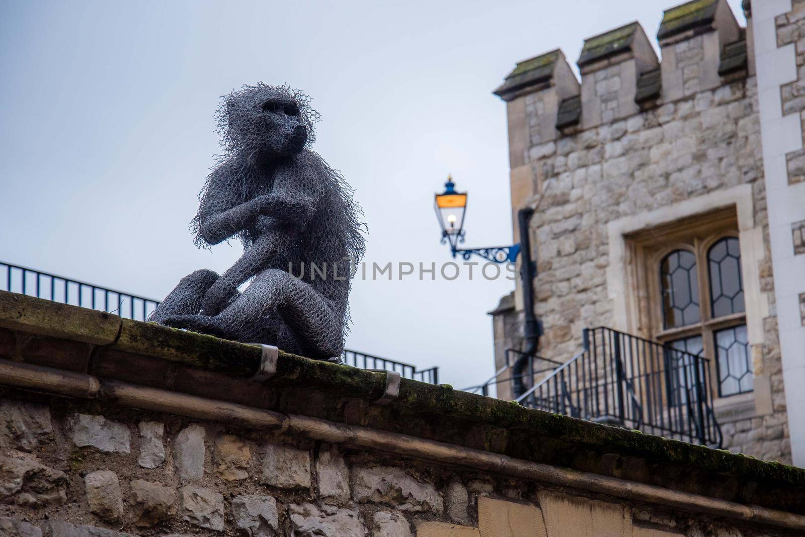 Royal Menagerie monkey statue at the Tower of London Castle. by jyurinko