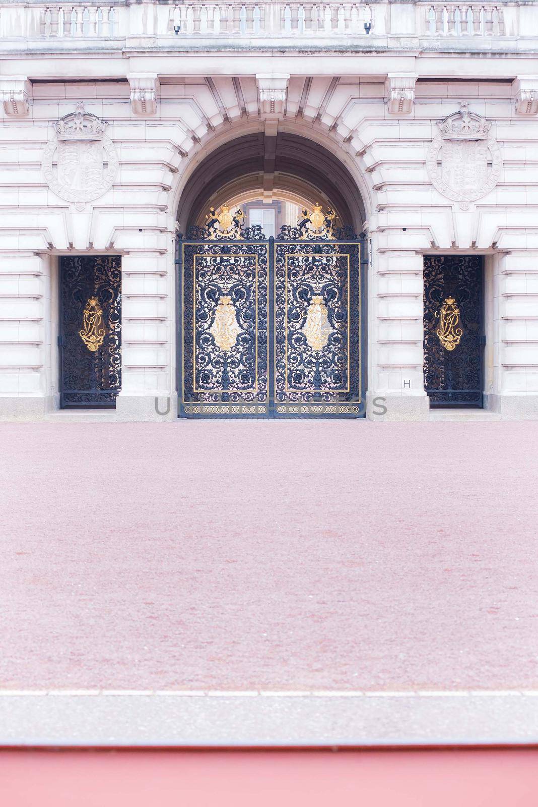 Buckingham Palace's gates and beautiful royal architecture by jyurinko