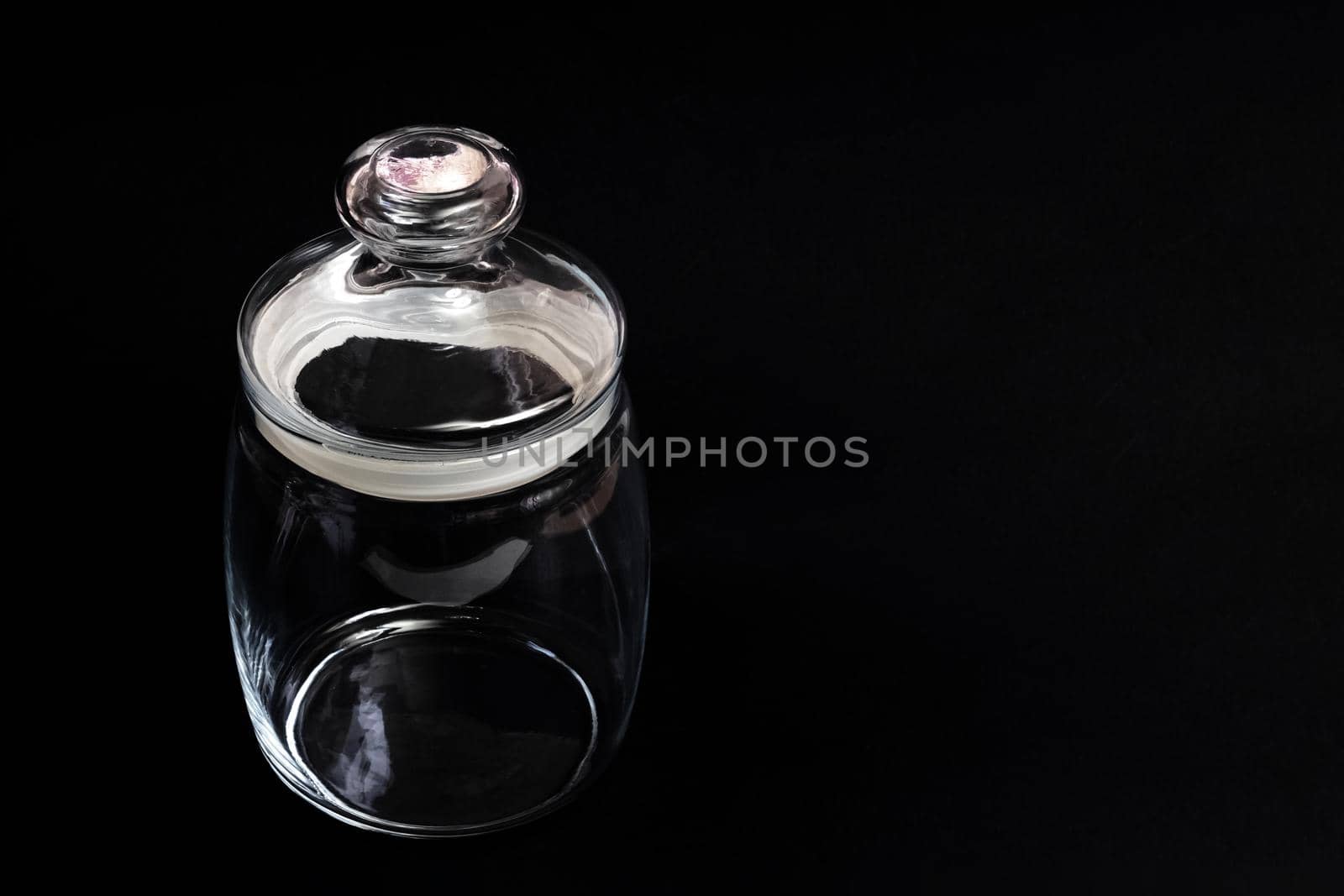 Decorative glass jar on a black background by Vera1703