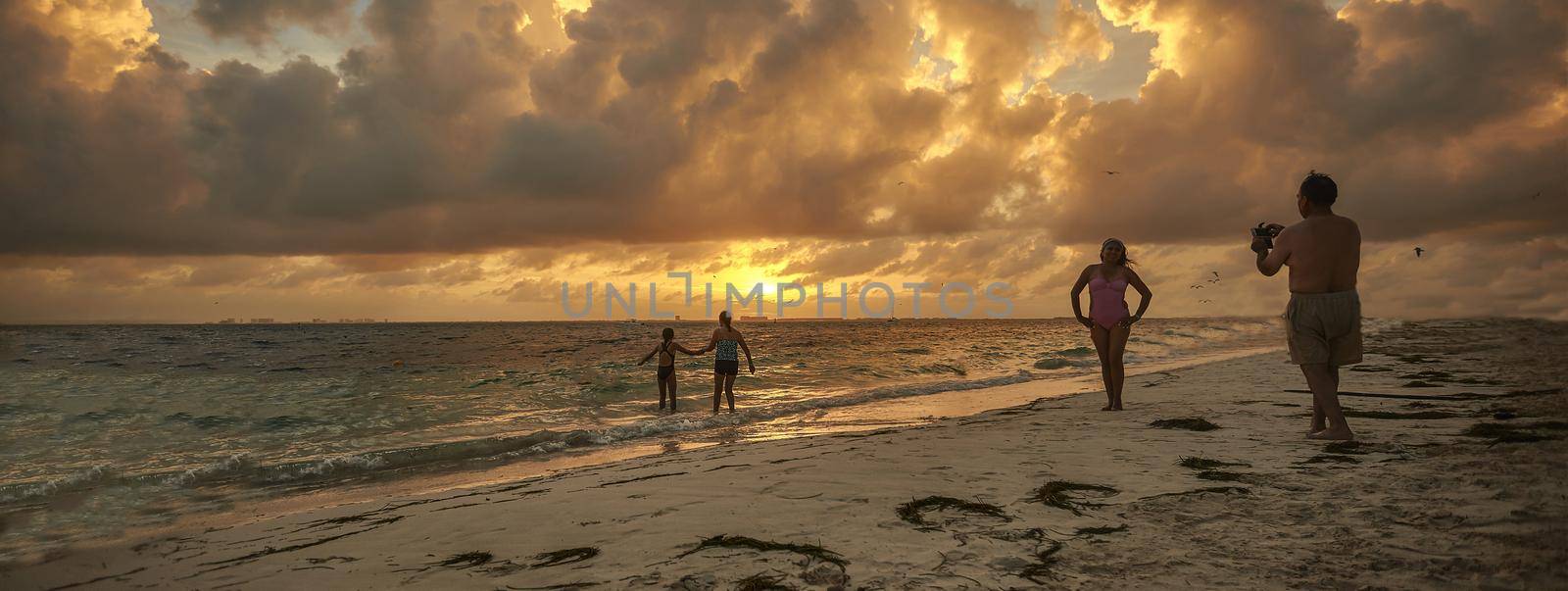Caribbean beach sunset family by pippocarlot