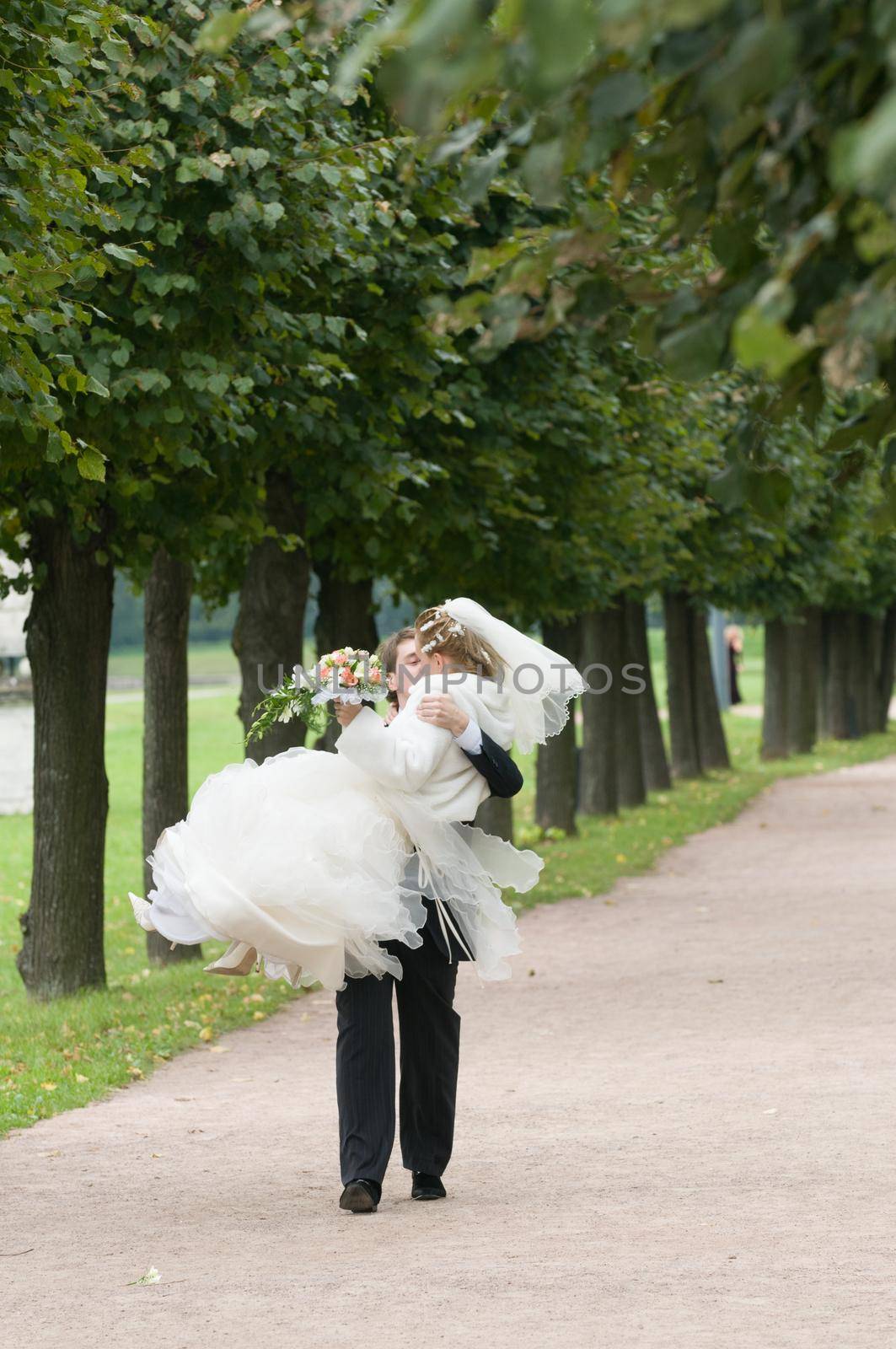 Young wedding couple together after the ceremony