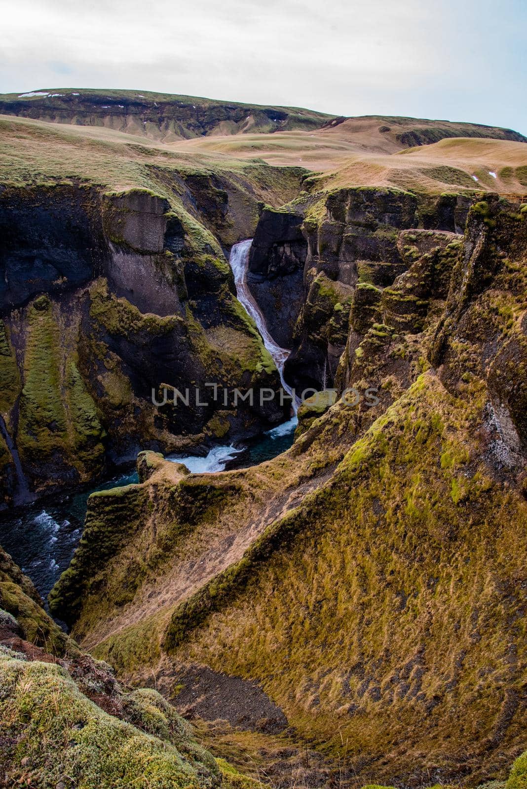 Fjaorargljufur, Iceland mossy green canyon with breathtaking views. by jyurinko