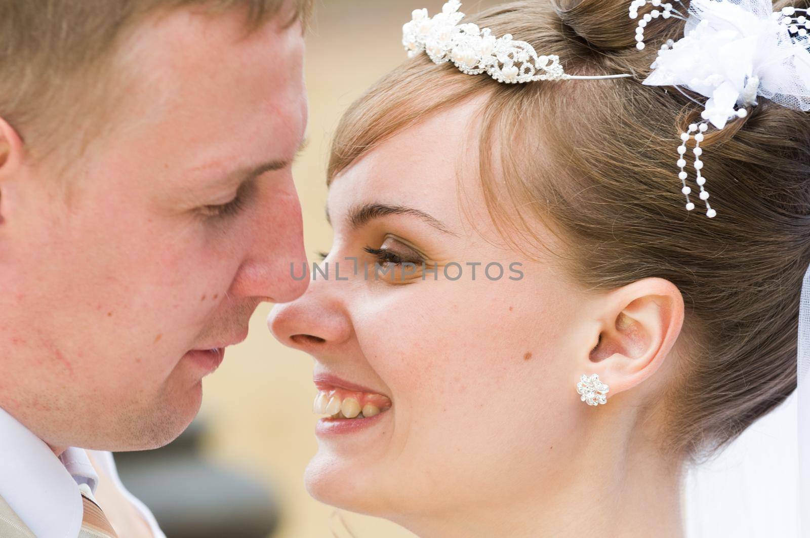 Young wedding couple together after the ceremony