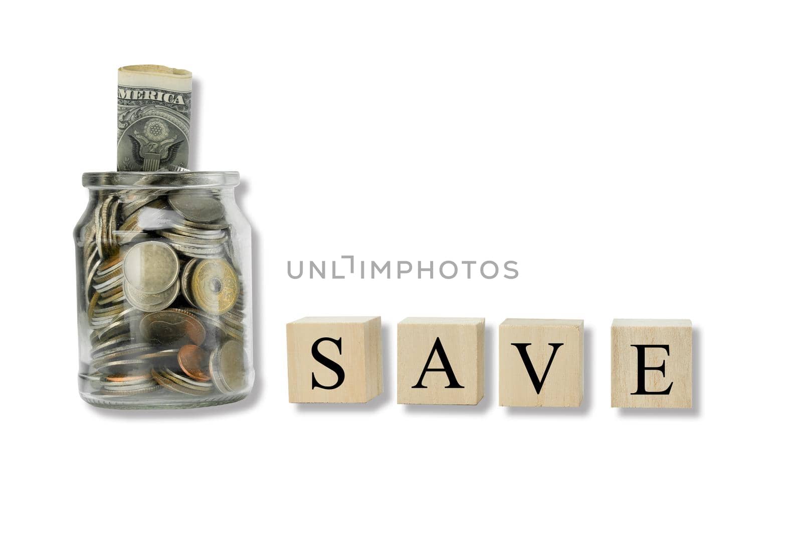 Coins in glass jar with copy space on isolated white.  Save money concept