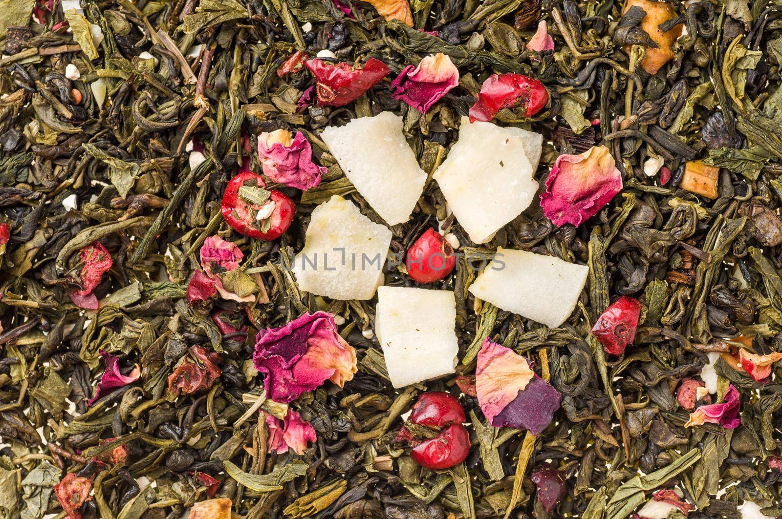 Heap of dry chinese green tea - background texture. Macro shot