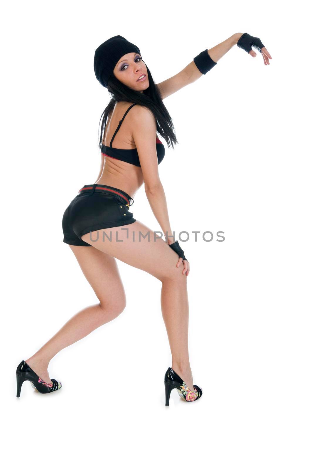 Cool modern dancer posing over white studio background