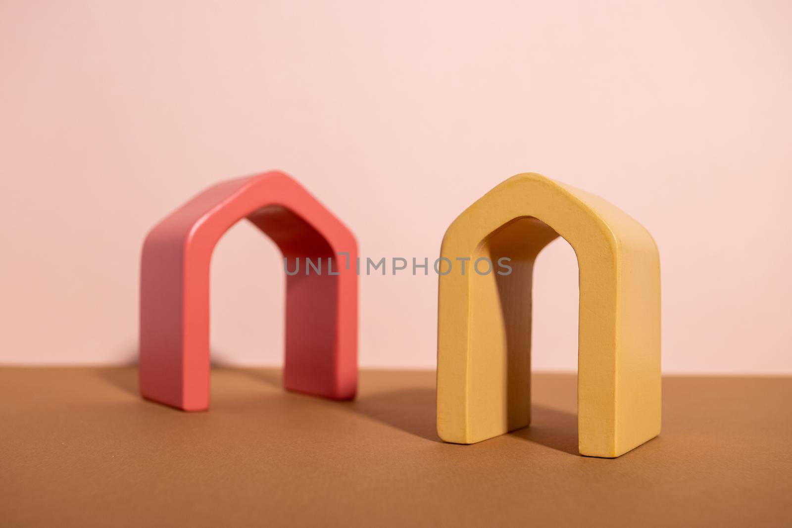 Abstract background trendy composition with geometric shapes form. Exhibition podium arch for product presentation on pastel beige background side view