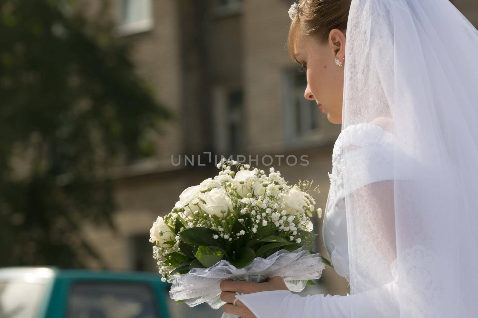 Happy Young bride posing before wedding ceremony