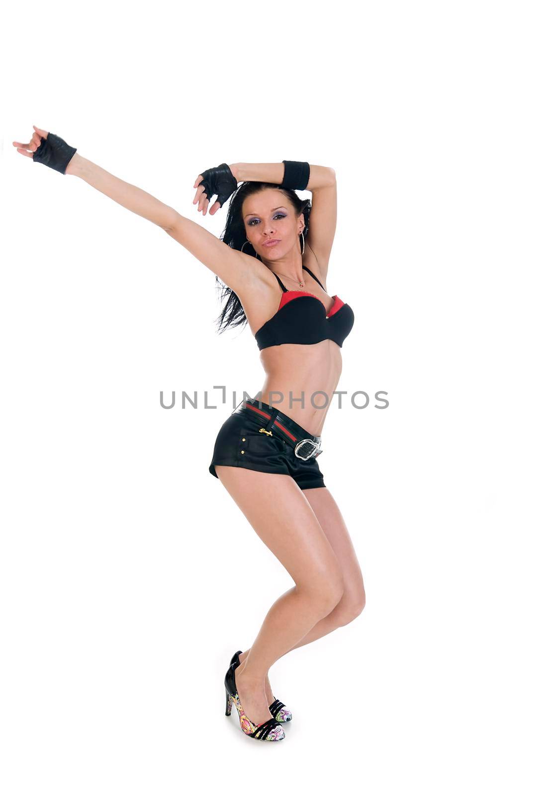 Cool modern dancer posing over white studio background