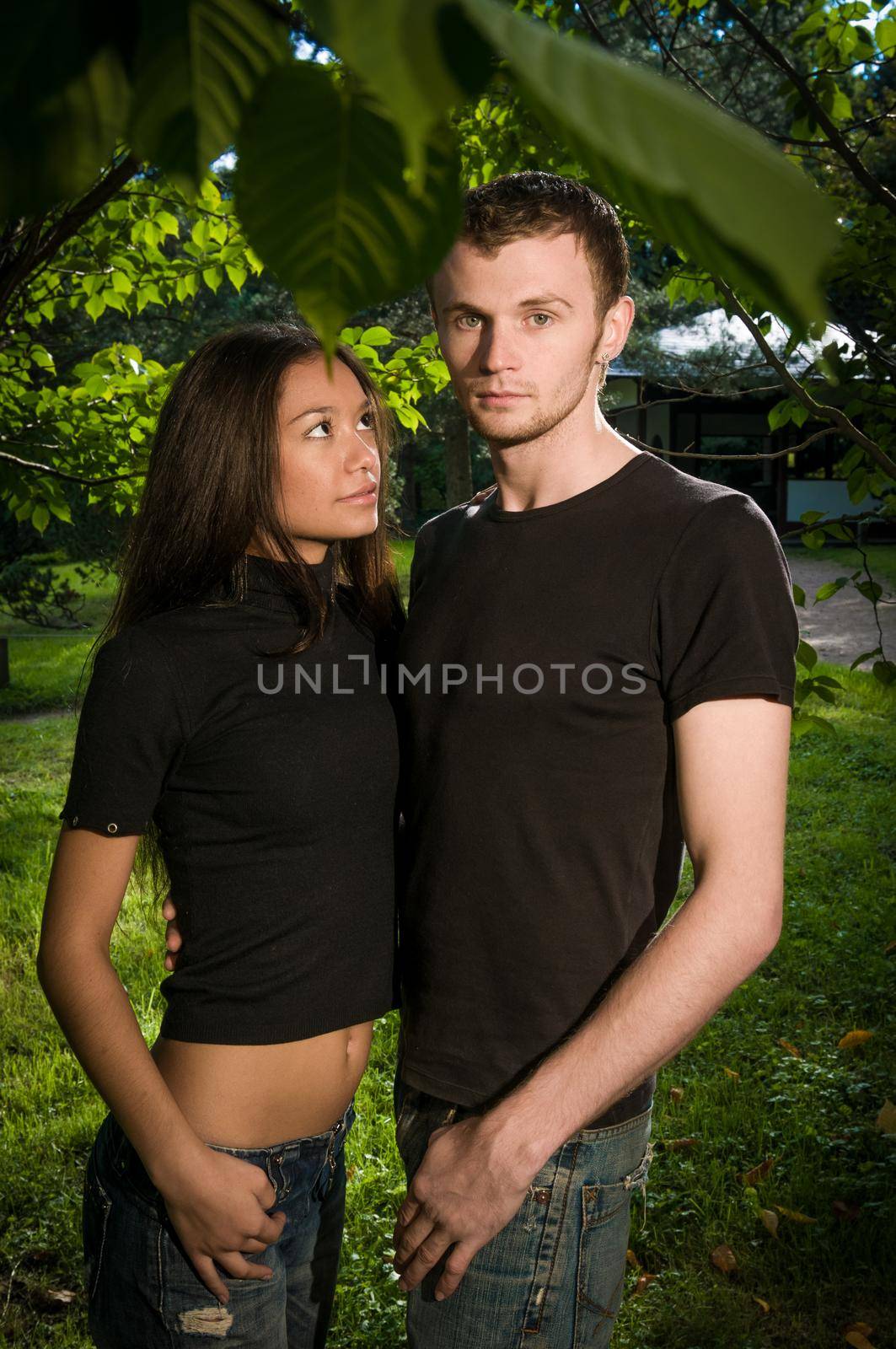 Young caucasian heterosexual couple spending time together at the park