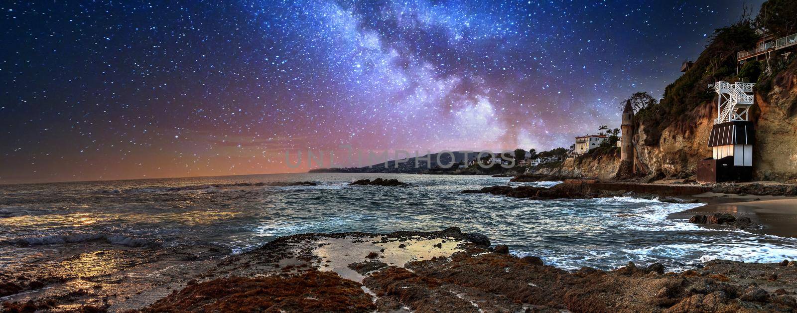 Milky way over Pirates tower at Victoria Beach in Laguna Beach, California, USA