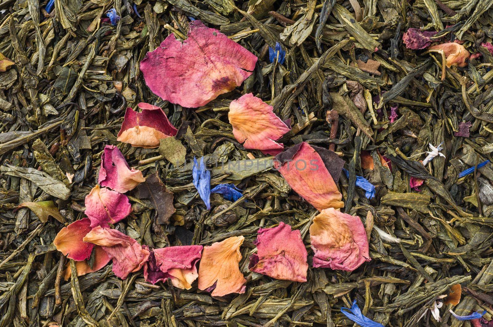 Heap of dry chinese green tea - background texture. Macro shot