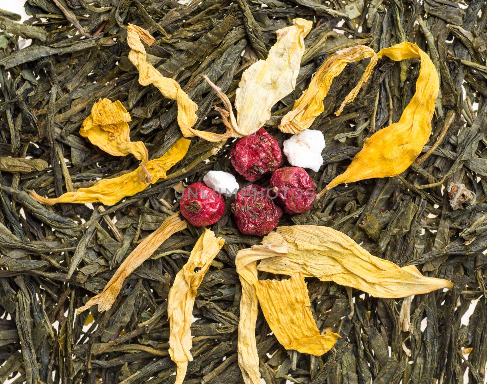 Heap of dry chinese green tea - background texture. Macro shot