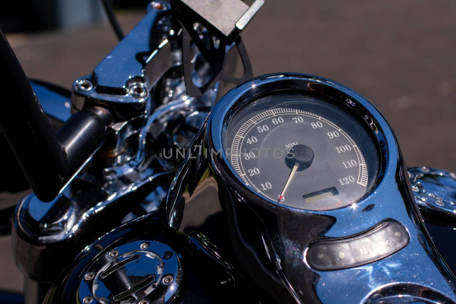 A Chrome Speedometer on a Motorcylce by bju12290