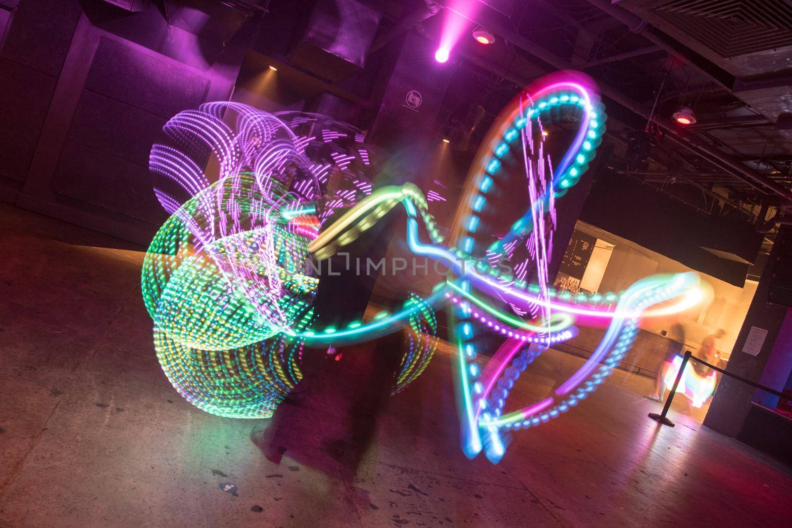 Abstract art of light painting timed exposure vibrant neon colors and unique shapes