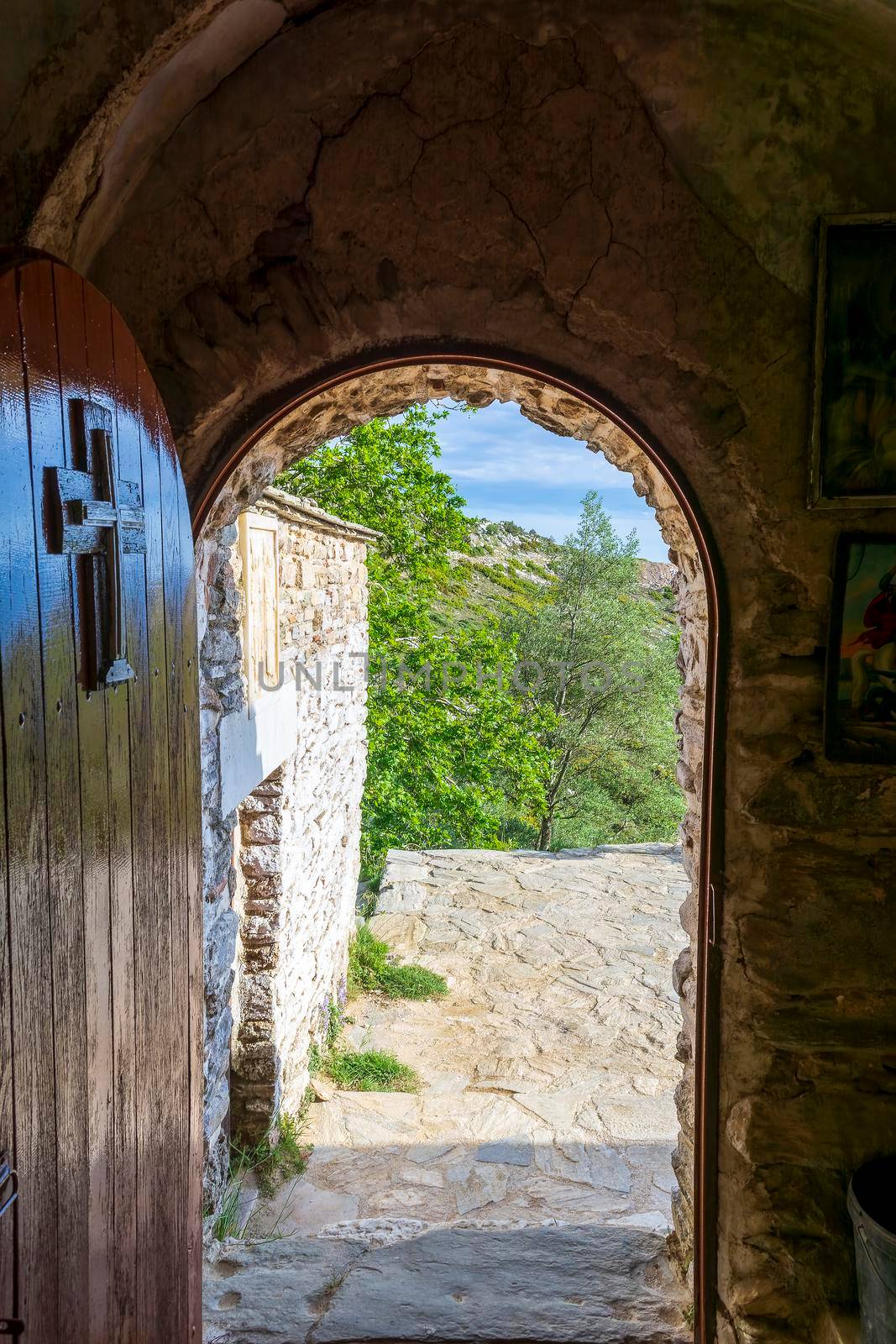 Entrance of Orthodox monastery Saints Asomatos in Penteli, a mountain to the north of Athens, Greece. by ankarb