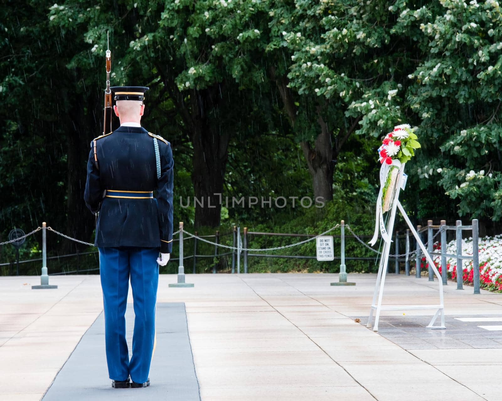 Ceremony at the Tomb of the Unknown soldier in Arlington, VA cadet from. the back