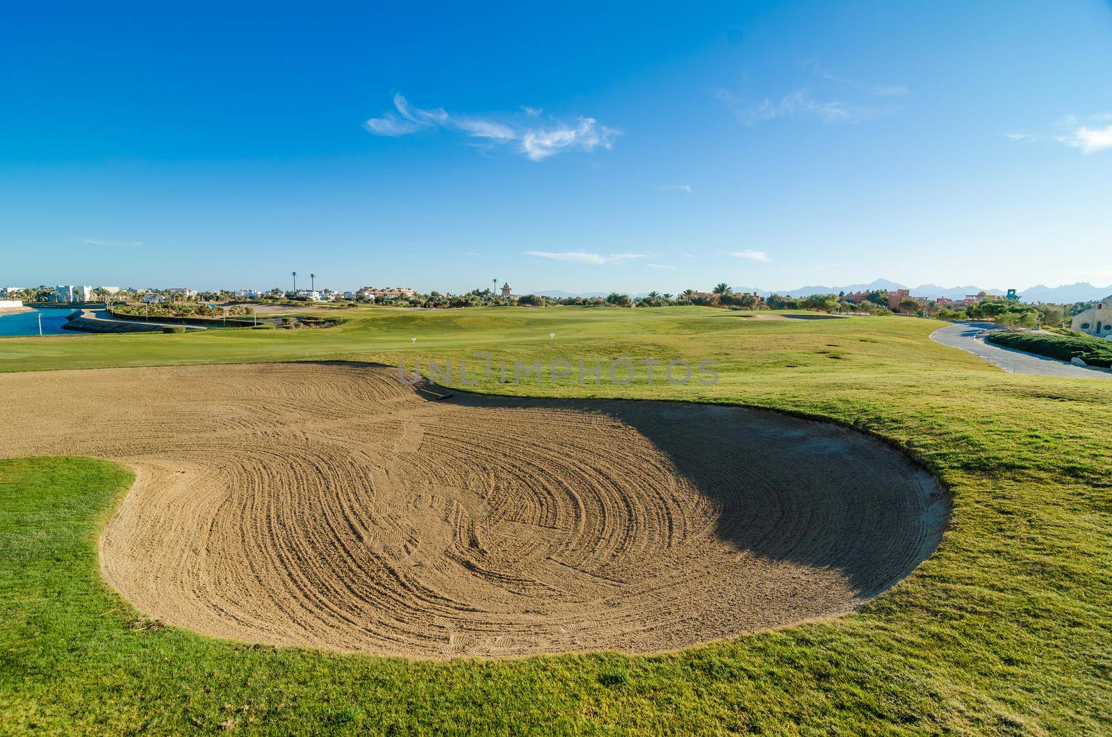 African golf course at sunset on a warm day