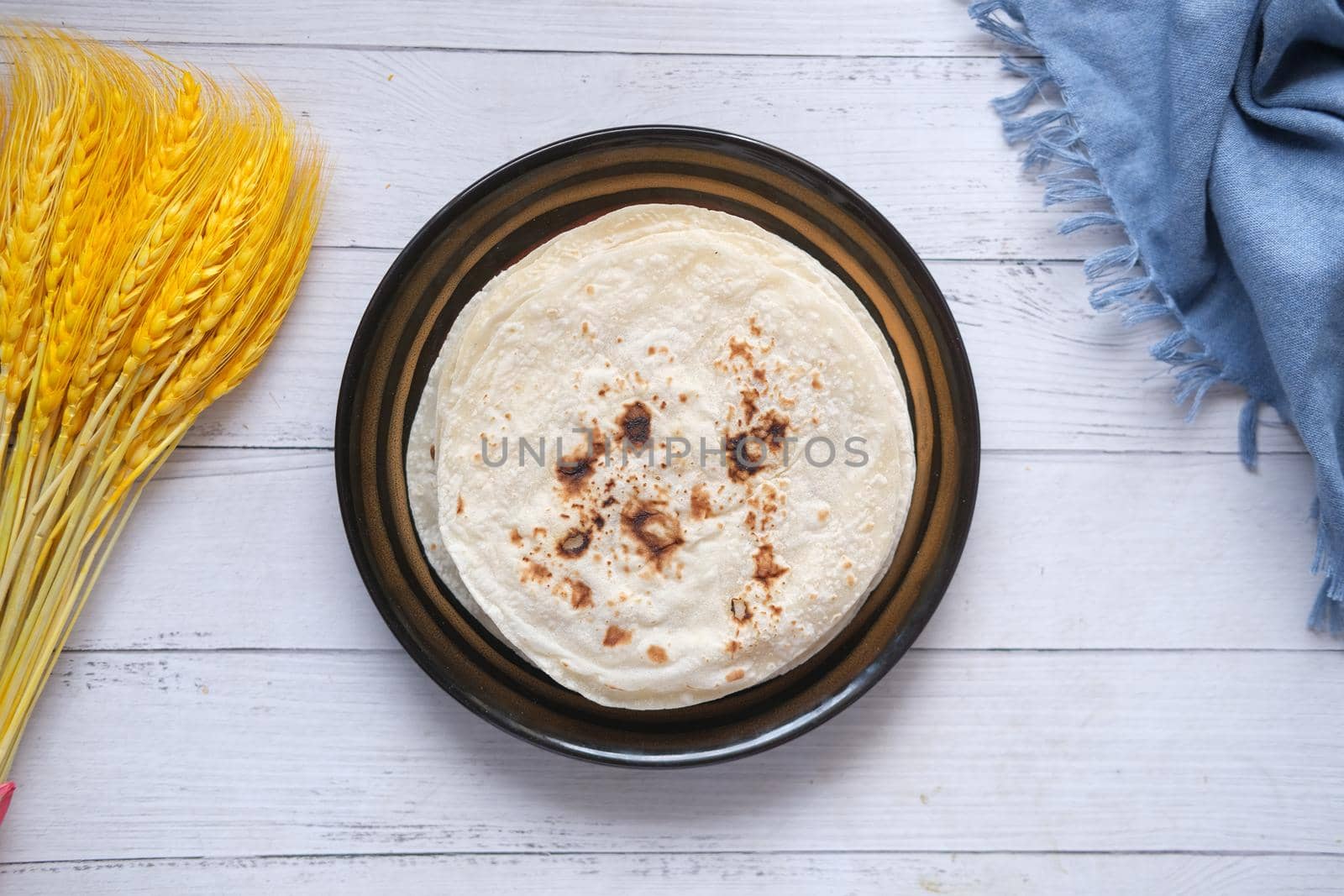 homemade roti chapati on table .,