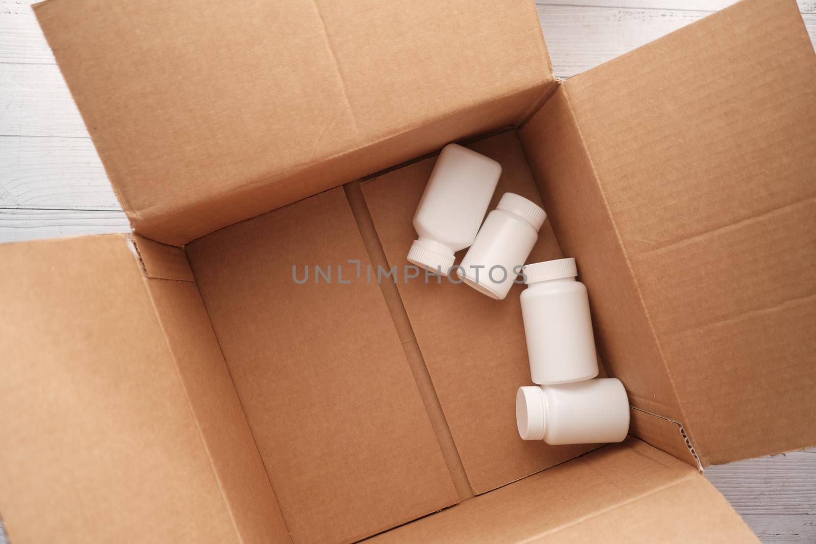 medical pill containers in open a box ,