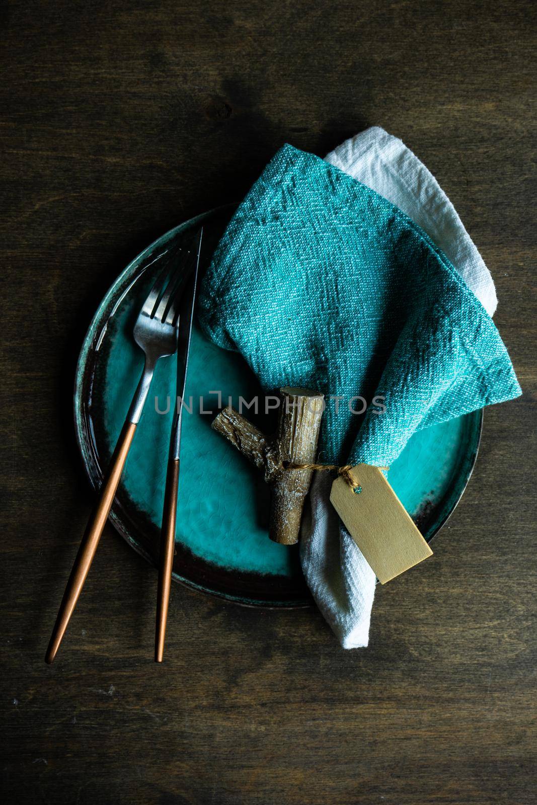 Autumnal table setting on wooden table for Thanksgiving celebration