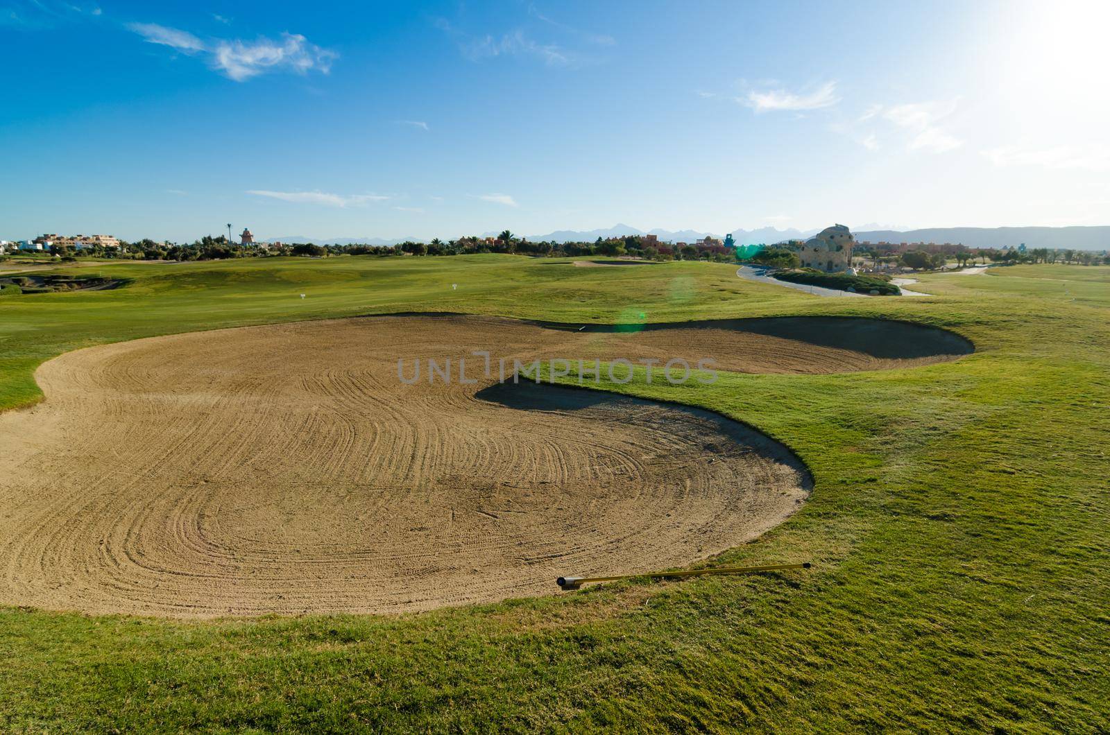 African golf course at sunset on a warm day