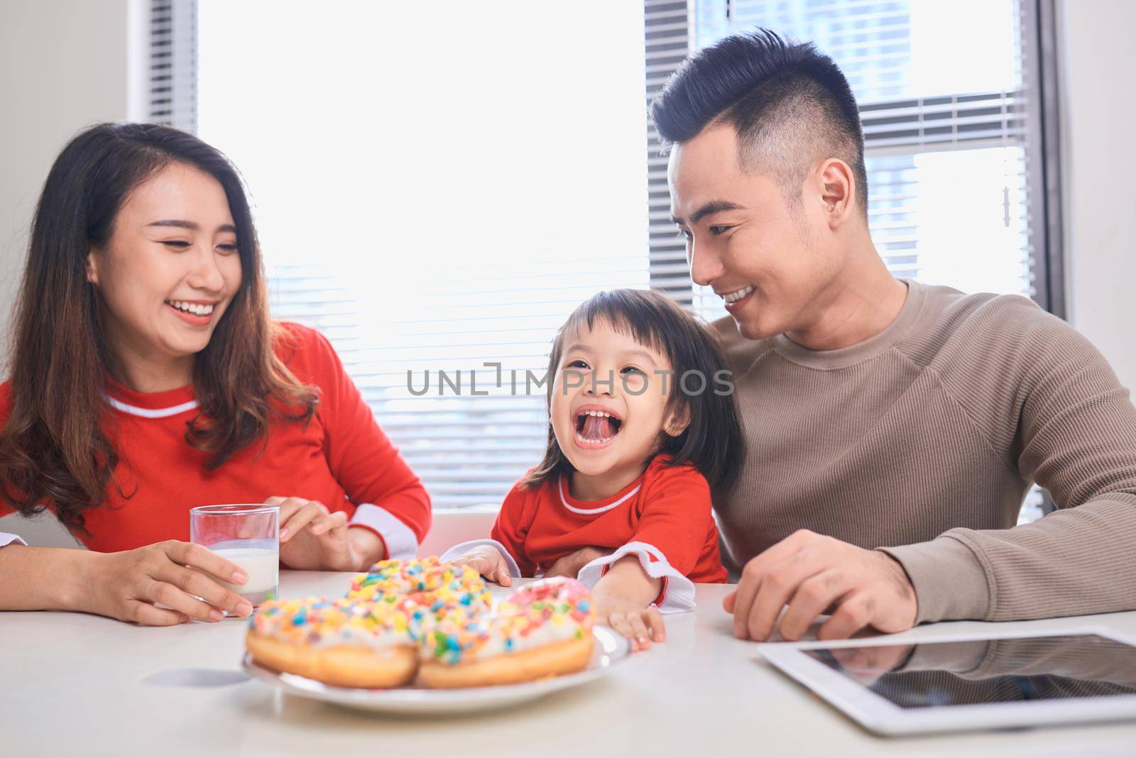 happy family has breakfast in the morning