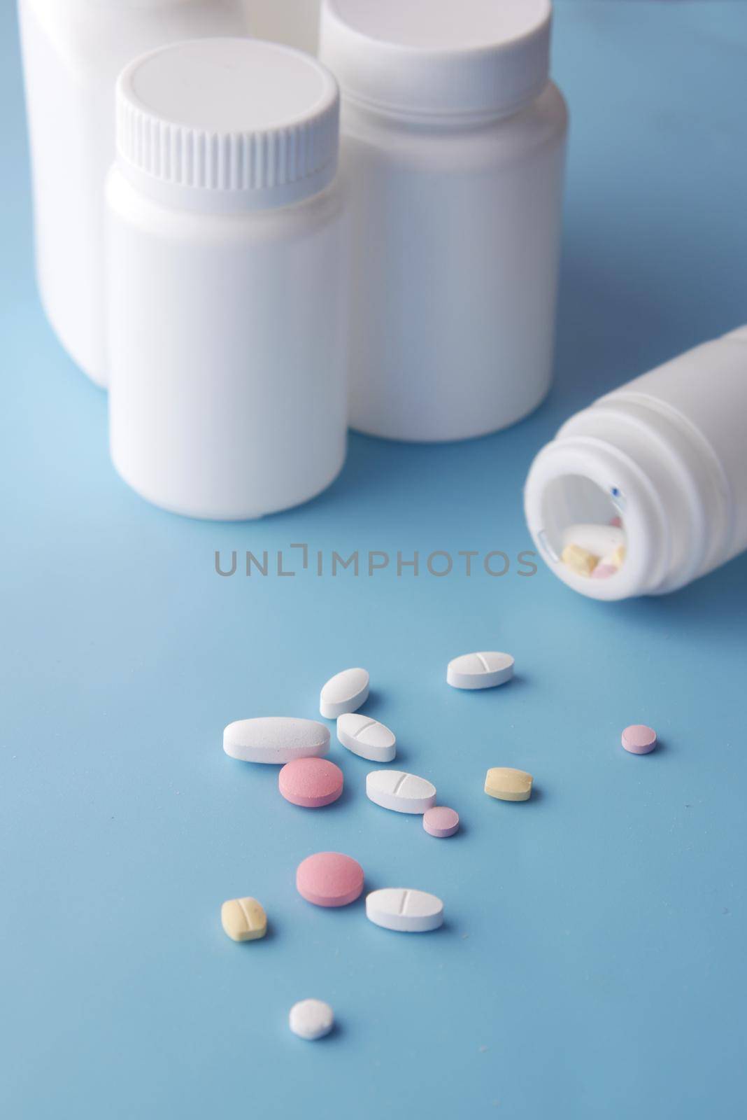 selective focus. Close up of many colorful pills and capsules .