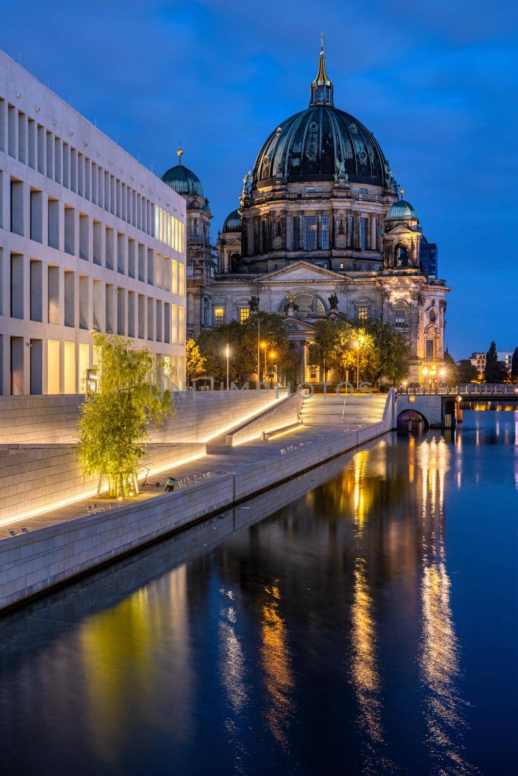 The Berlin Cathedral and the modern backside of the City Palace at night