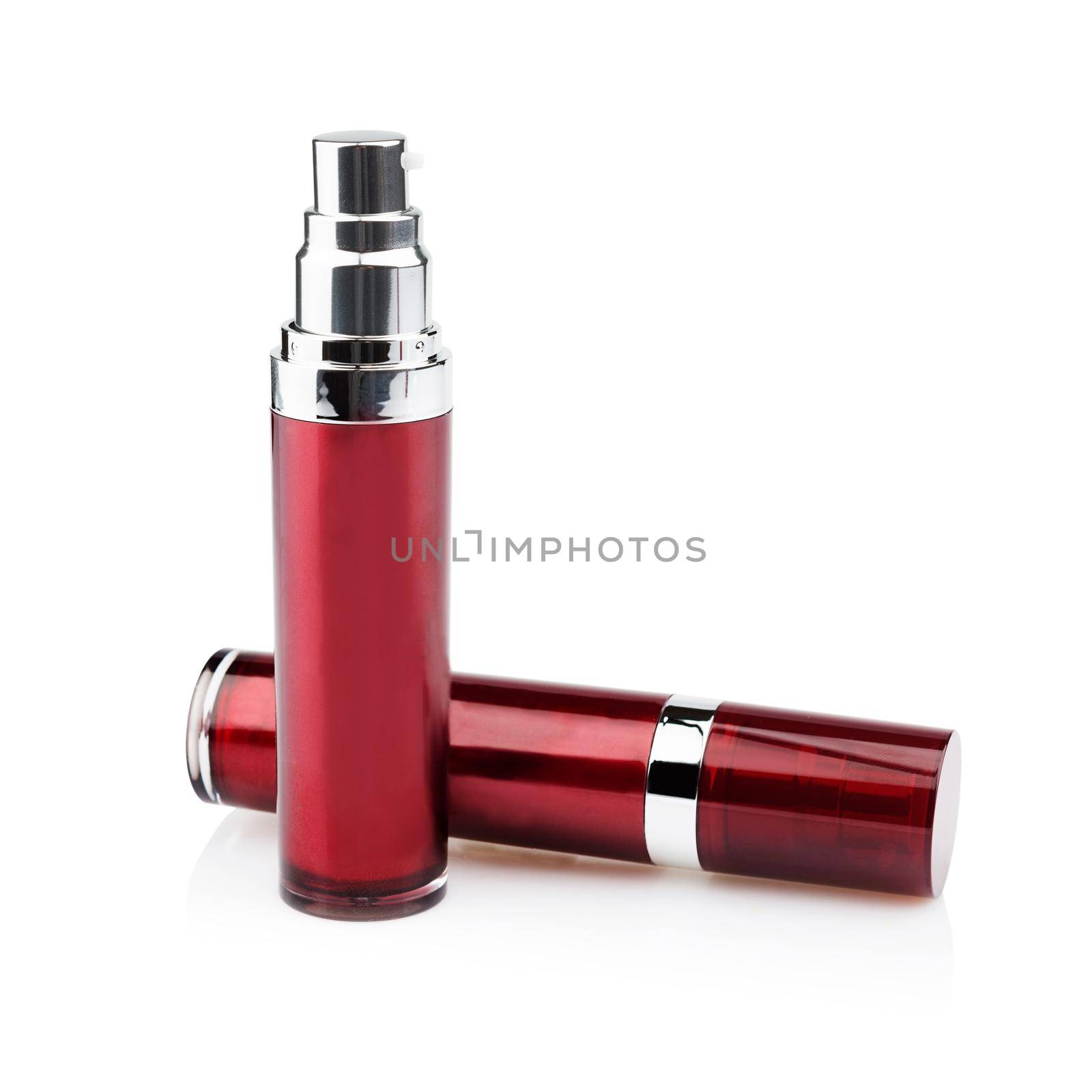 Red cosmetic cans isolated
